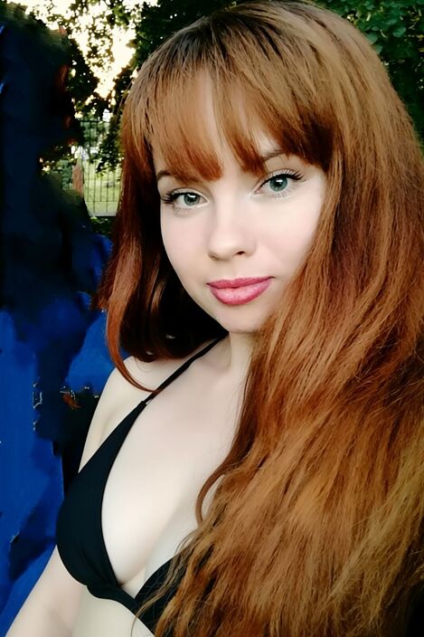 В чорному купальнике