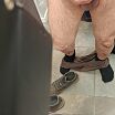 В примерочнлй кабинке большого магазина