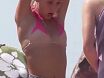 young girls undress on the beach